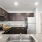 kitchen with modern appliances and dark cabinets