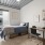 bed in room with natural lighting