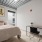 bed near window and desk