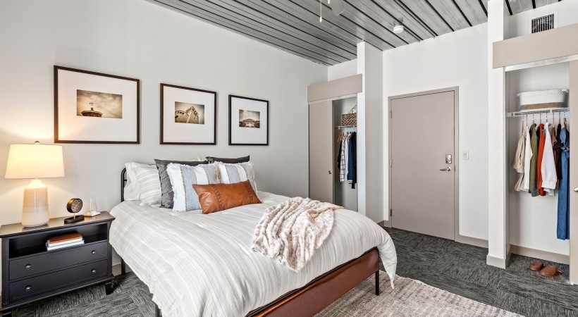 Bedroom with natural lighting and high ceilings