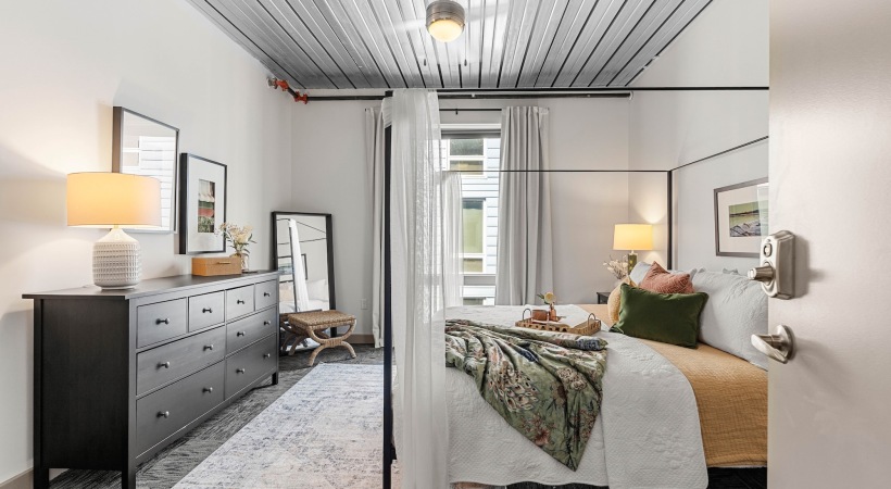 Bedroom with natural lighting and high ceilings
